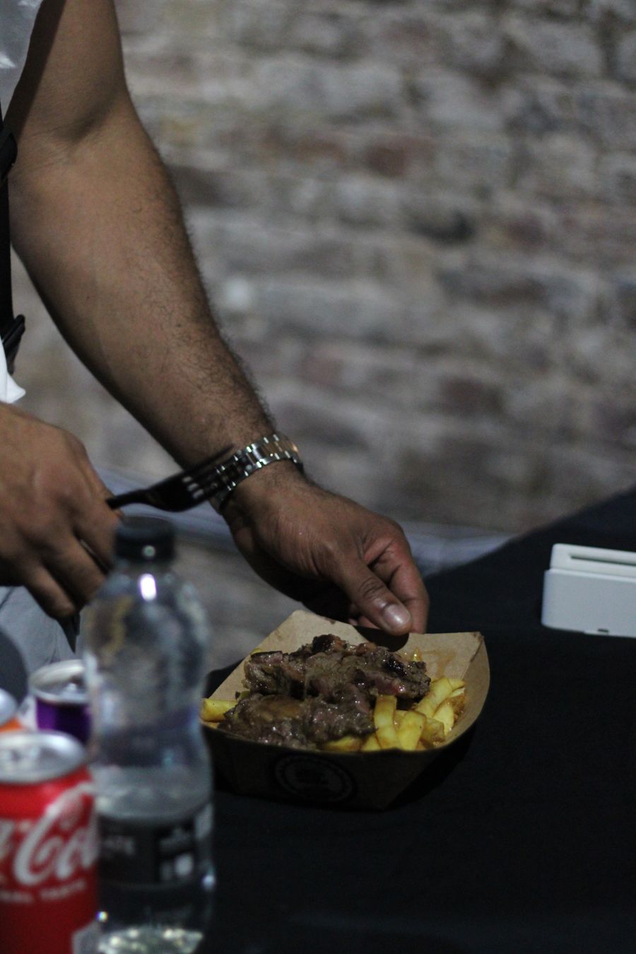 Serving a plate of steak and chips